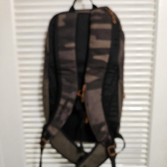 Dakine Camouflage Backpack with Yellow and Brown Accents main image 9